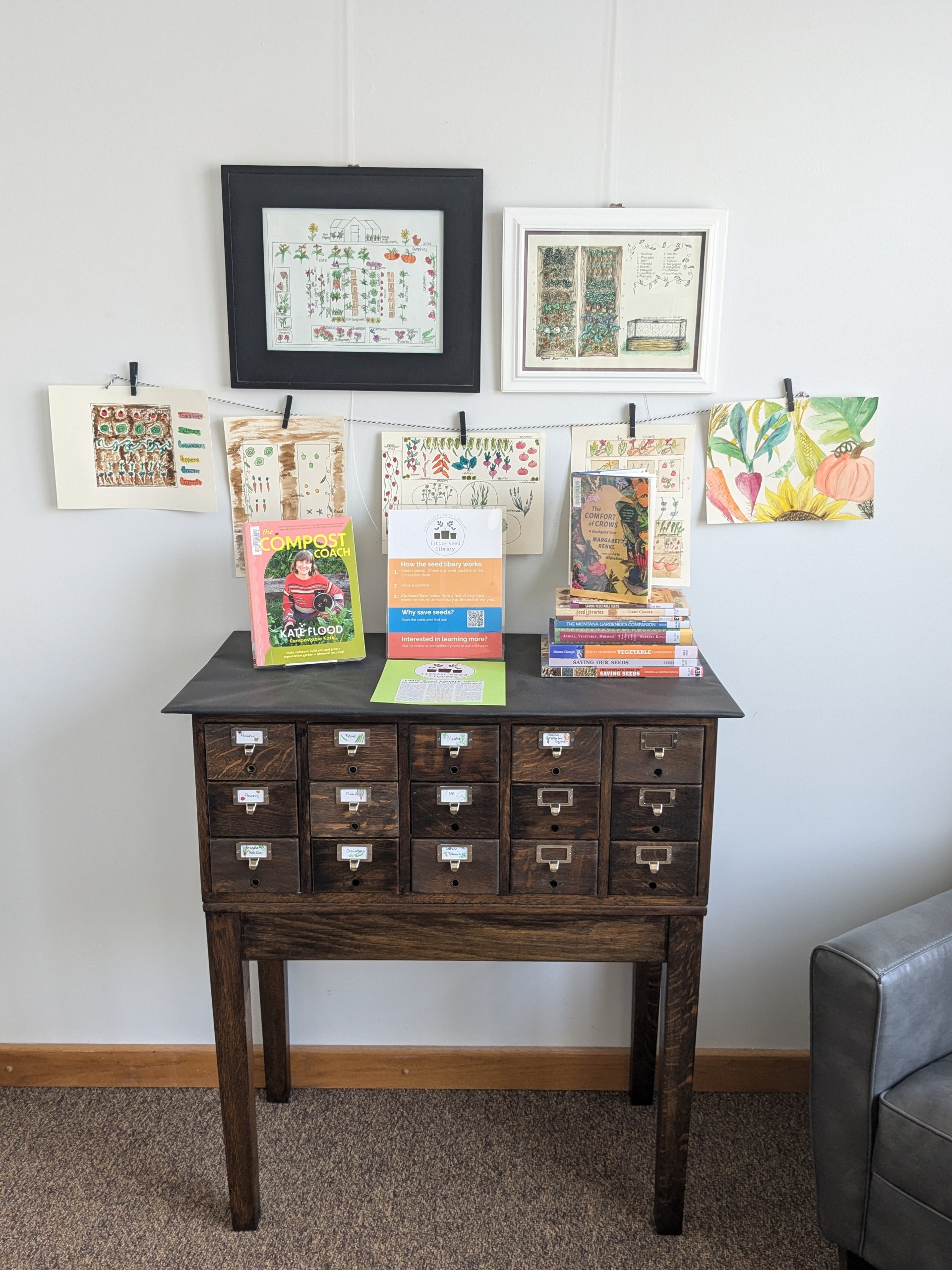 A repurposed card catalog holds seed packets for the Conrad Little Seed Library.